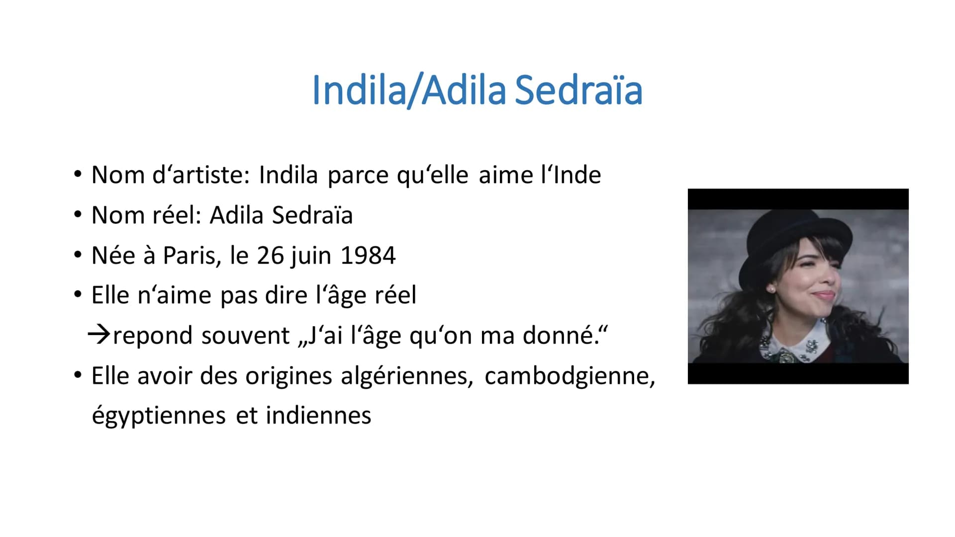 <h3>Indila - La Chanteuse</h3>
<p>Indila, également connue sous le nom d'artiste Adila Sedraïa, est une chanteuse française née à Paris le 2